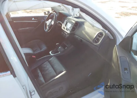 2013 Volkswagen Tiguan Sel z USA, uszkodzony, nr VIN WVGBV3AX1DW617607